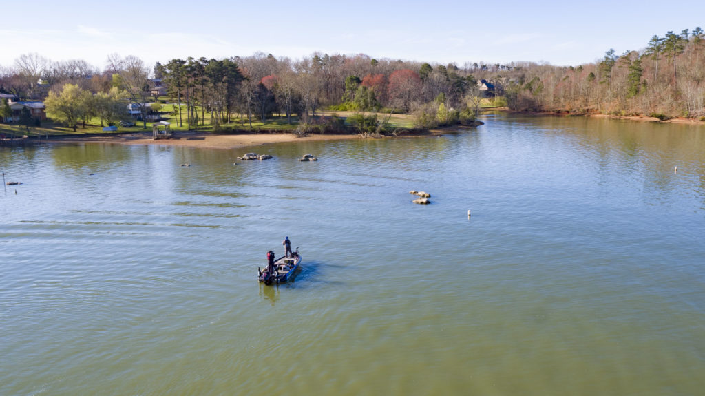 Drone shot of bass boat in the lake at the 2019 Bassmaster Classic