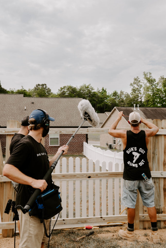 behind the scenes shot on set of Tim's Fencing commercial