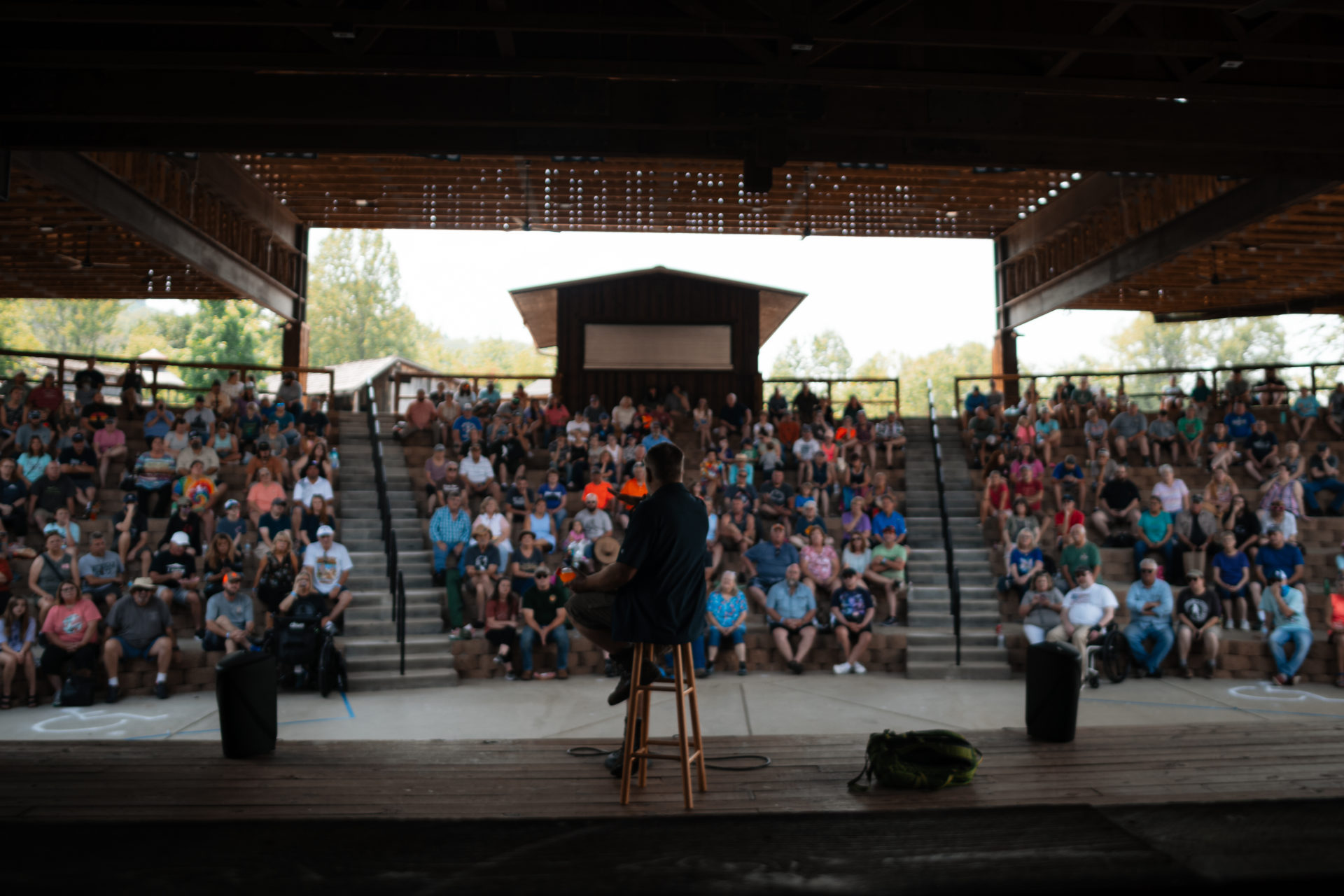 Event photography of a crowd listening to a presentation at the Smoky Mountain Bigfoot Festival.