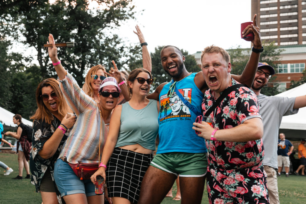 Event photography of a group of excited people at Hops in the Hills craft beer festival in Maryville, TN.