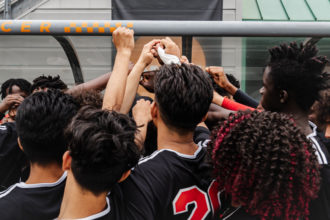 Austin East Men's Soccer Team Celebrating at Regal Stadium at the University of Tennessee