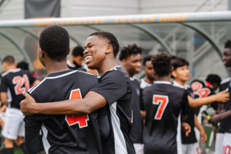 Austin East Men's Soccer Team Celebrating at Regal Stadium at the University of Tennessee