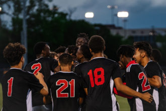 Austin East Men's Soccer Team Celebrating at Regal Stadium at the University of Tennessee