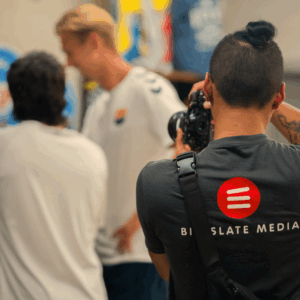 social media intern A videographer at Big Slate media holding a camera
