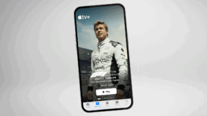 A phone shows the F1 haptic trailer on the Apple TV app.